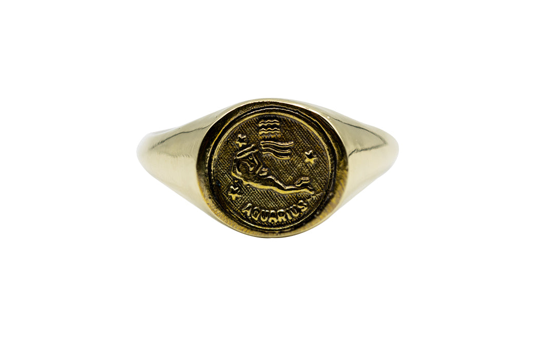 Vintage Brass Astrology Ring. Can be changed to Gold. This ring has Zodiac Aquarius. Handmade in a jewelry store in Brooklyn NYC