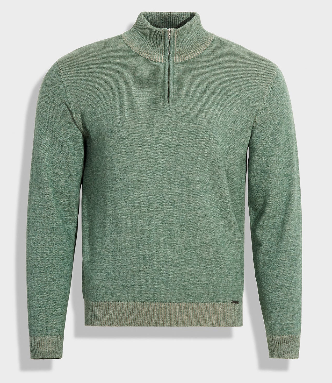 Green sweater with a quarter zip on a light gray background