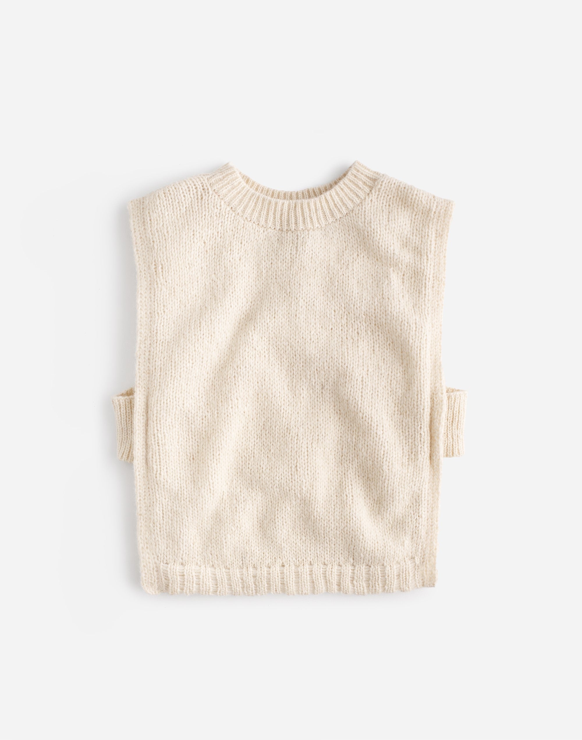 Munasiri Llama Vest — hand-knitted llama wool vest, timeless layering piece inspired by the Aymara word for love, handmade in Bolivia.