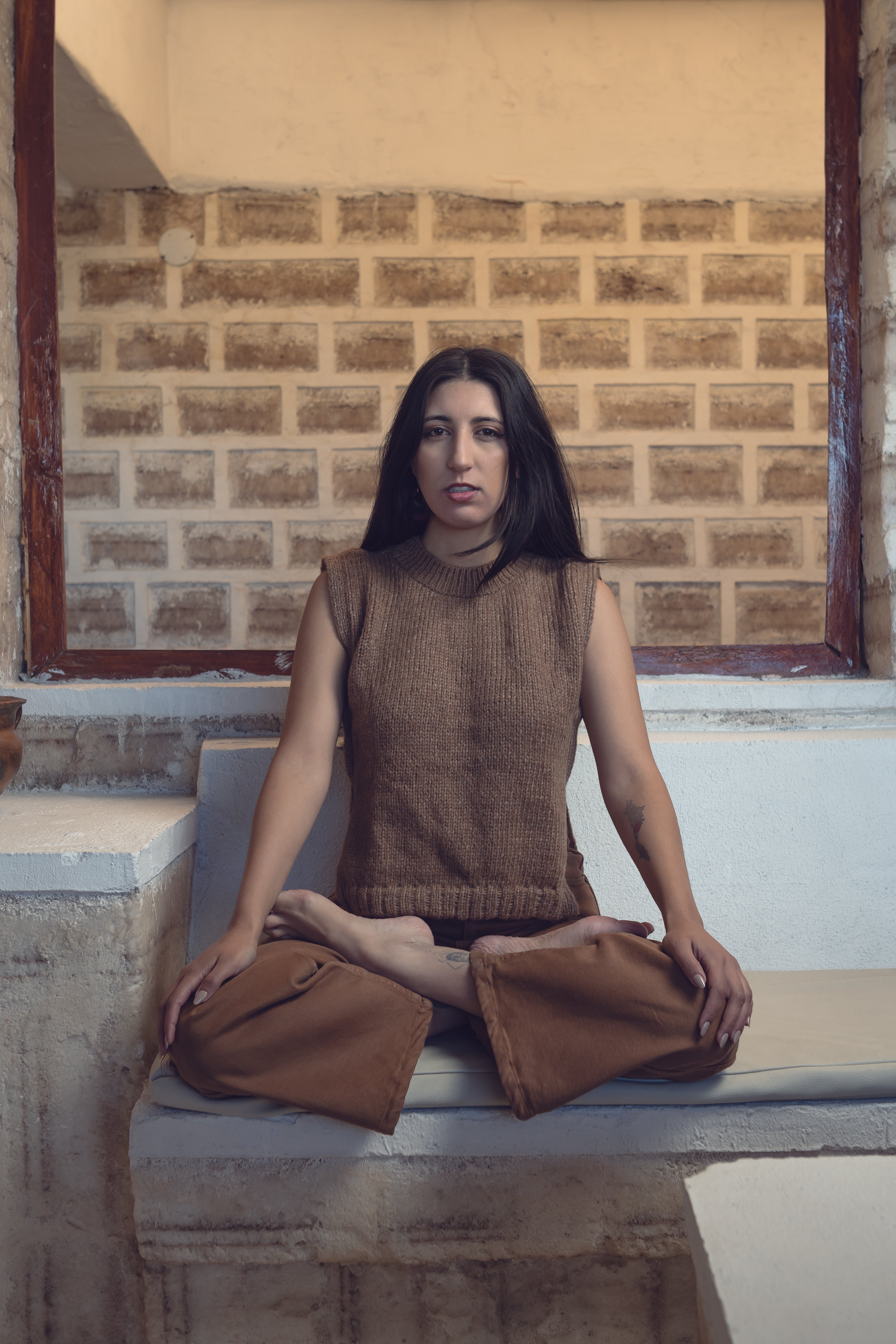 Munasiri Llama Vest — hand-knitted llama wool vest, timeless layering piece inspired by the Aymara word for love, handmade in Bolivia.