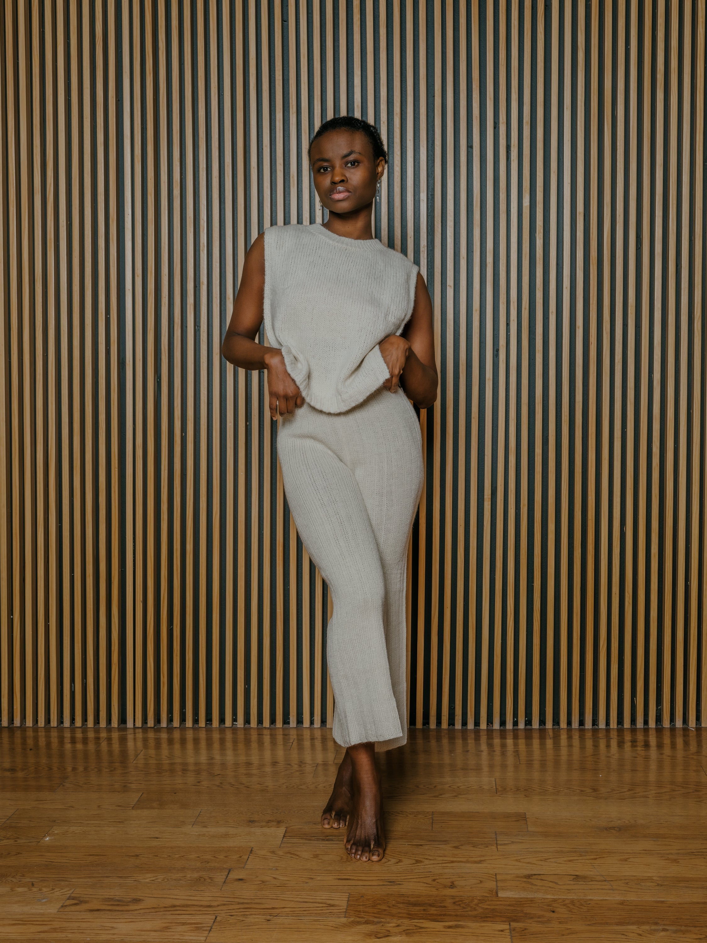 Munasiri Llama Vest — hand-knitted llama wool vest, timeless layering piece inspired by the Aymara word for love, handmade in Bolivia.