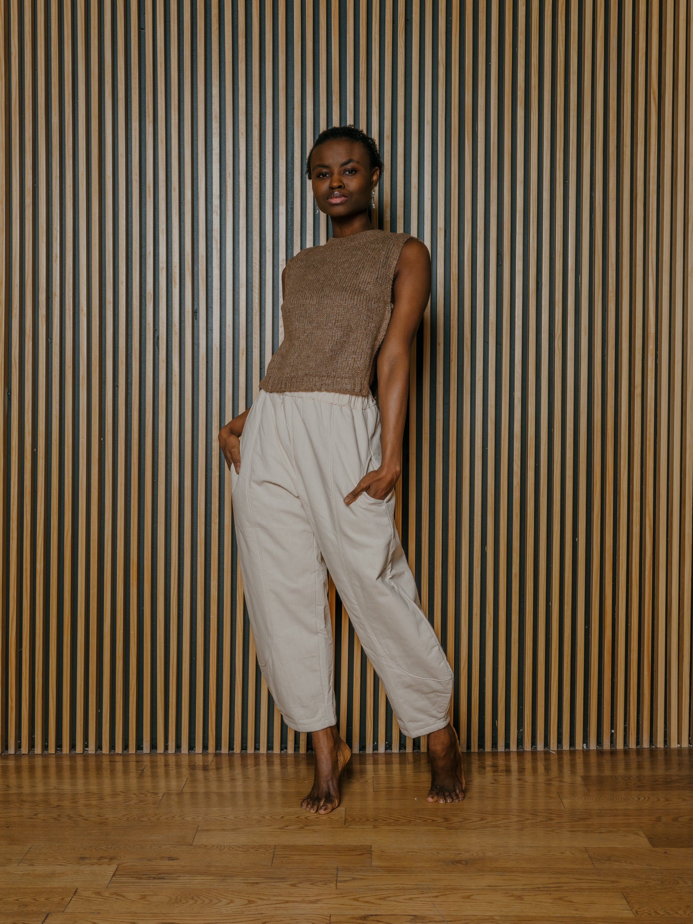 Munasiri Llama Vest — hand-knitted llama wool vest, timeless layering piece inspired by the Aymara word for love, handmade in Bolivia.