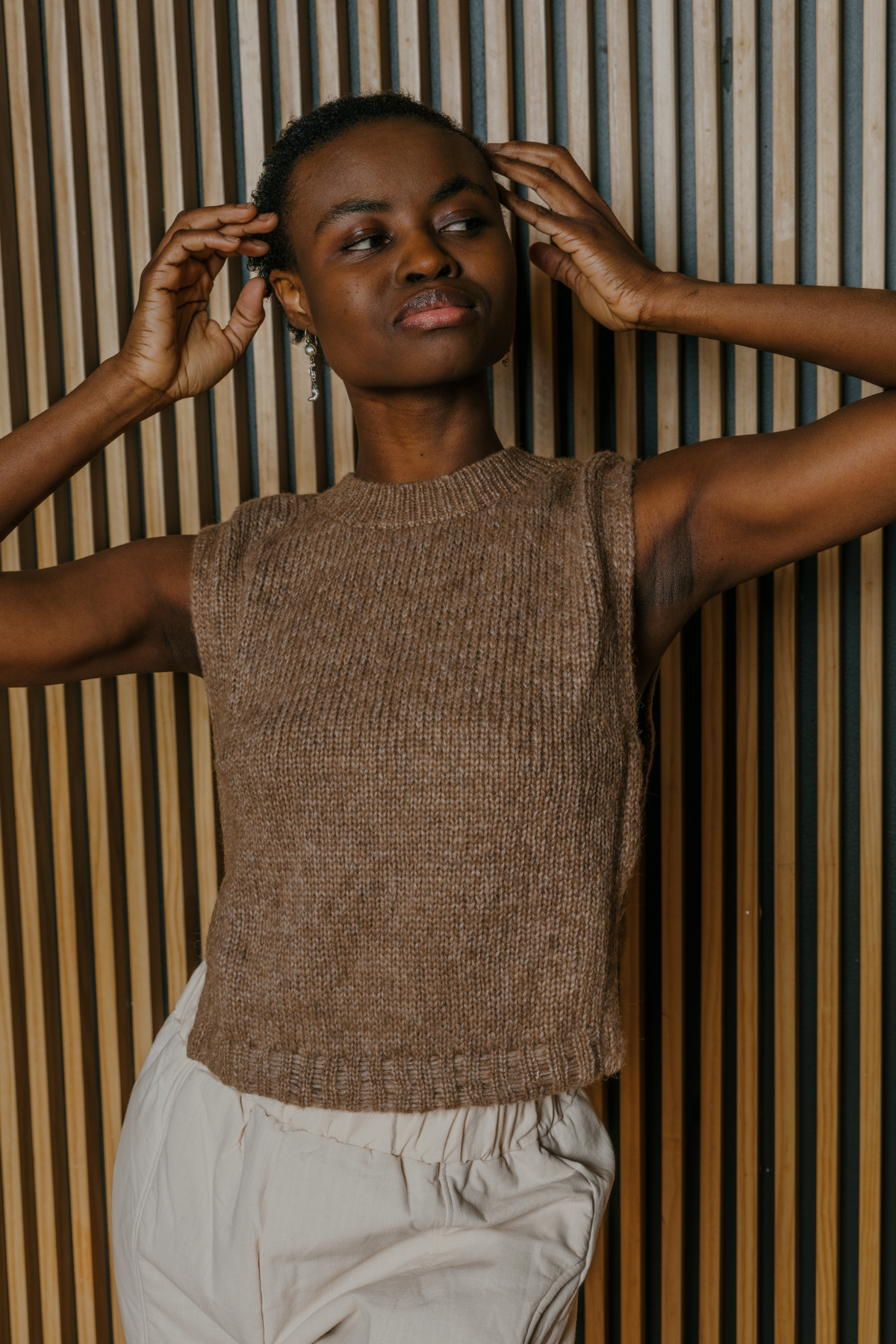 Munasiri Llama Vest — hand-knitted llama wool vest, timeless layering piece inspired by the Aymara word for love, handmade in Bolivia.