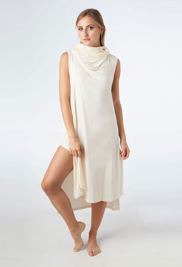 Woman wearing Ivory color Echape - a gender neutral long summer dress