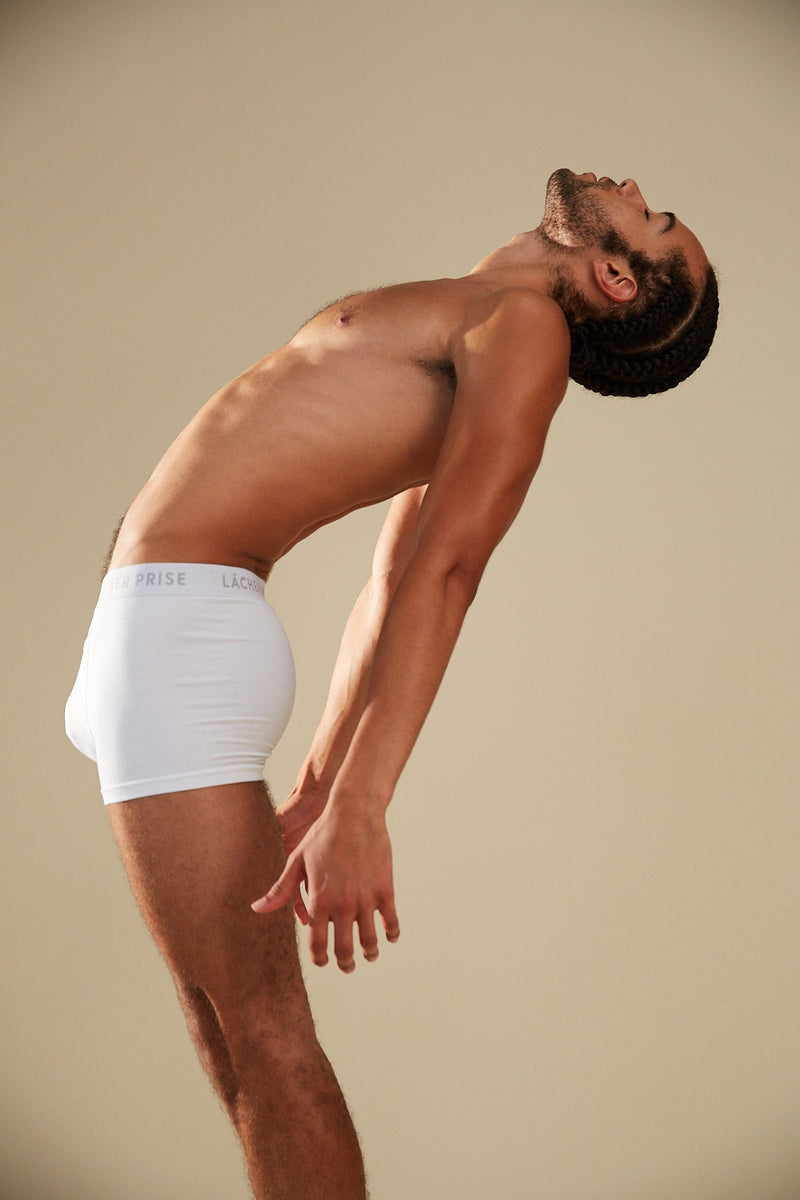 White boxers for men and women - Lacher Prise Model bending down