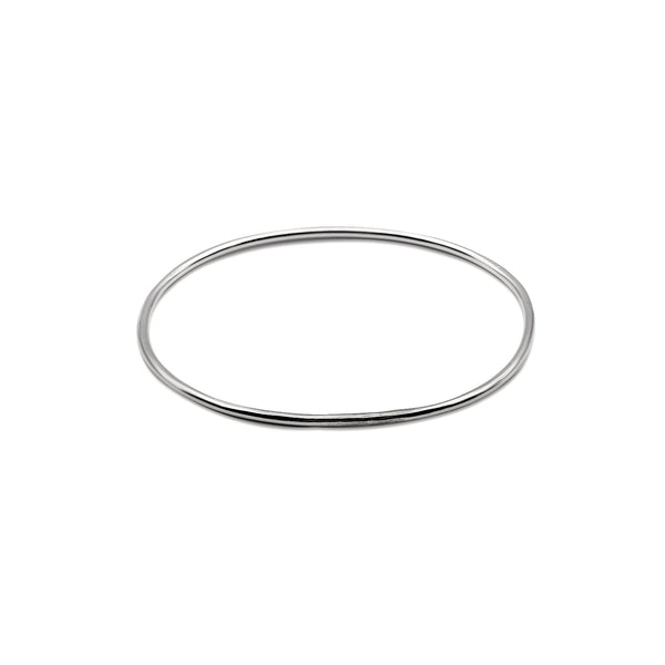 Classic Simple Vintage Thin Hammered Bangle Bracelet made of sterling silver. Silver custom Jewelry handmade in Brooklyn
